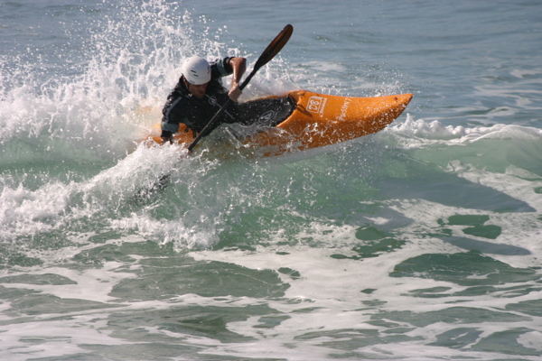 Hall surfing a wave in Morocco, 2008 - photo by Yellowboy