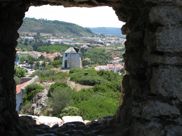 View of an old windmill from the Obidos Castle Walls